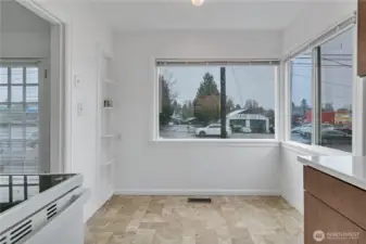 Eat-in kitchen area- could be great for a built in banquette