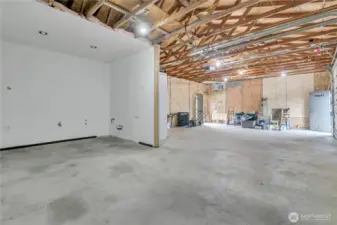 Expansive 1050 sq ft garage that could be used as a shop or for commercial operations.