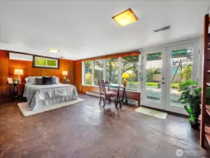 Large baasement bedroom with plenty of space for an office, workout space, or whatever you can dream up.