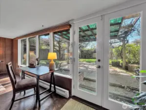 French doors leading to the covered patio and large backyard.