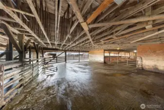 Another view of the holding pen as well as the stall barns