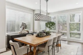 Large eating space off gourmet kitchen.  This table & chair set can stay along with most of the furniture.