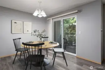 Dining area virtually staged.