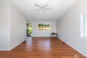 Entry and living room, with vaulted ceilings.