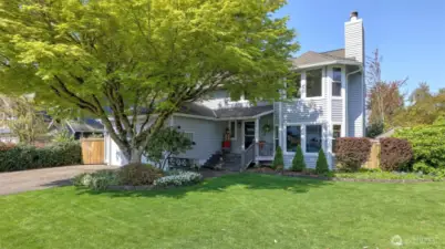 This spacious home offers a thoughtful layout ideal for both everyday living and entertaining. Enjoy a generous lot with plenty of room for outdoor activities, all within a friendly, well-kept community. Enjoy peace of mind with new upgrades including gutters, exterior paint, carpets, garage doors, and so much more! Enter to discover rich engineered hardwoods throughout most of the main level. Upstairs offers a large primary with cozy fireplace and en suite bathroom. Enjoy two more fireplaces on the main floor for those cozy PNW nights. Close to shops, dining, parks, schools, trails and major freeways for easy commuting.This home radiates curb appeal from the moment you pull up and continues up to the large Trex decking patio to greet your guests.