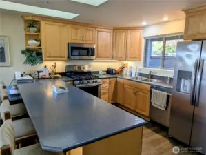 Updated birch cabinets installed approximately 2018.