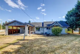 Home is located on a large corner lot with off street parking and large carport for 2 cars.
