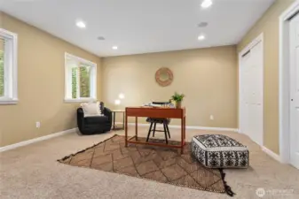 Generous sized flex space off the entrance lives as a den, office or fourth bedroom with pocket doors that slide closed for privacy