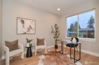 Den/office or 5th bedroom on the main level.