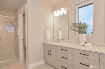 Primary bath with double vanity.