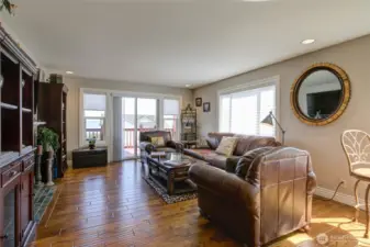 Living room has southern and eastern views, and a deck out front to enjoy the sunrises and moon rises.