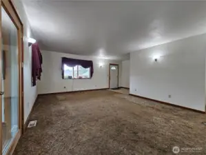Large Living Room off the Kitchen with French Doors to the Huge Sun Porch