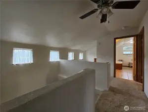 Love all the Windows looking out over your land!  Perfect little reading nook in the corner!