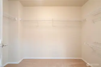 His and Her closet in mater bathroom