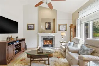 High ceilings and a ceiling fan create an airy, comfortable space