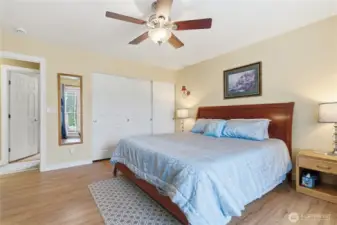 Spacious primary bedroom with plenty of room for your furniture and a comfortable retreat