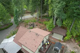 Check out the back deck from primary bedroom, wood shed, tool shed, & fenced-off firepit and doggie park!