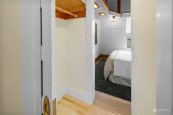 Bedroom has vestibule entrance with closet and additional closet space within the room.