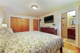 Primary bedroom & bathroom with radiant heated bathroom floors