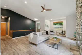 Another view of the main level. The door at the back, on the right, gives access to the garage.