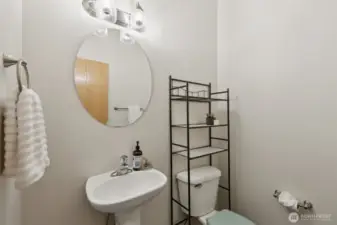 Half guest bathroom on the main level, with new light fixtures.