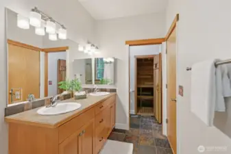 Another view of the ensuite bathroom—featuring a sauna at the back and a separate toilet for added privacy.