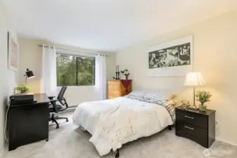 Primary bedroom is large , newer carpet & double closets!