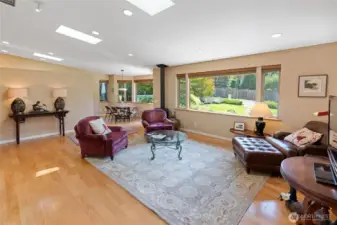 Light filled living room, hardwood floors.