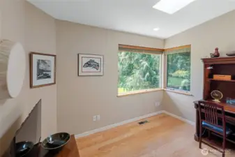 Sweet den/office space off entry, hardwood floors.
