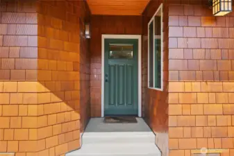 Newly treated cedar shingles add richness to siding.