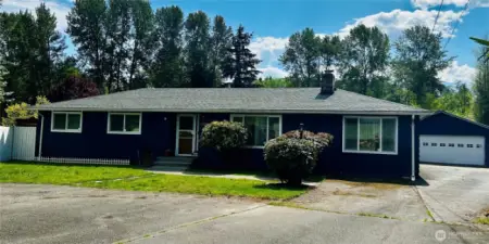 New exterior paint on the house and detached garage.