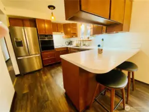 Guests can keep you company at the bar counter while you cook!