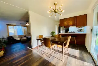 So much great natural light shining into the dining room and kitchen at sunset.
