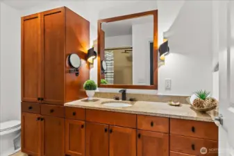 Full bath has ample line storage