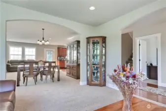 The main floor boasts high ceilings and hardwoods in the entry and the spacious gourmet kitchen.