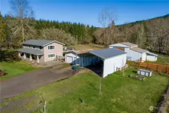 Aerial view of house, outbuildings, RV parking