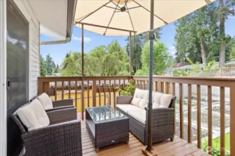 Covered deck, providing the ideal spot for year-round relaxation.