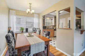 Spacious dining area with custom built in cabinets
