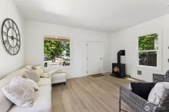 The perfect place to unwind—sunlit by day, cozy by the gas fireplace at night.