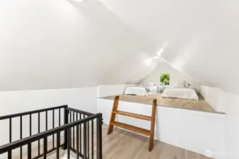 Vaulted ceilings and unique angles give this attic space character.