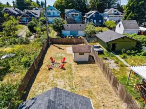 Room to grow! Backyard space with separate entrance possibilities for garage or an additional dwelling.
