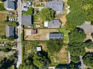 Large fully fenced lot with alley access—ideal for ADU potential or expanded parking.