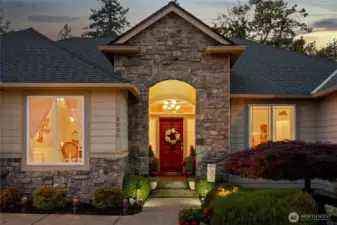 Inviting entryway sets a delightful first impression to this well-cared for home.