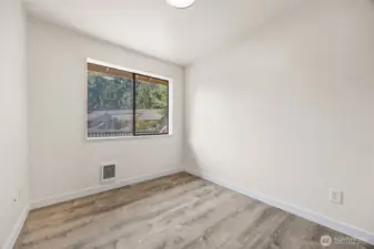 One of two bedrooms, fully updated and move-in ready ??