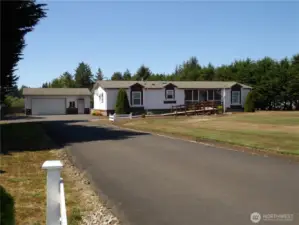 Welcome to 8005 Sandridge Rd.  One acre property set up for success.