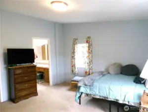 Ensuite is upon entering the house.  Just turn to the right and enter the primary bedroom with a full bath.