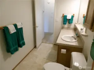 Exit bathroom to the 2 bedrooms on that end of the house.