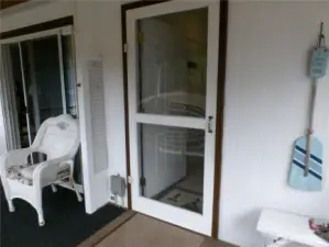 Back porch door goes directly into the laundry room.