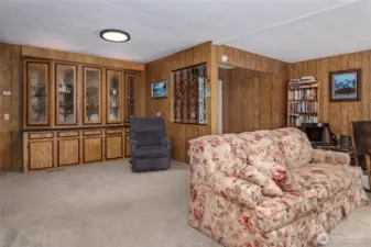 Living and dining room with built in hutch