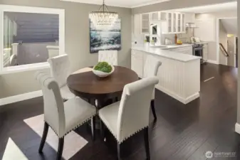 Dining room flows seamlessly from living room to kitchen.